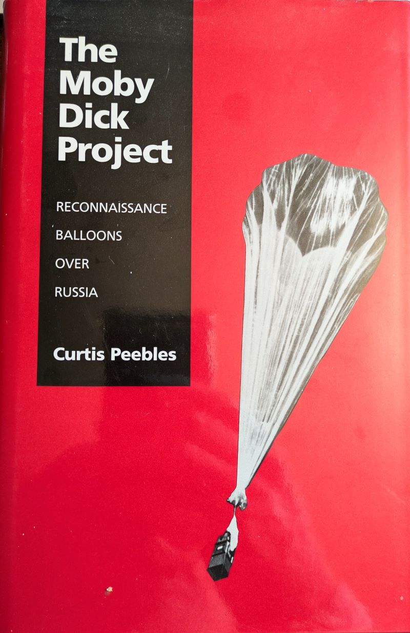 Picture of pictorial dust jacket showing high altitude plastic balloon against red background